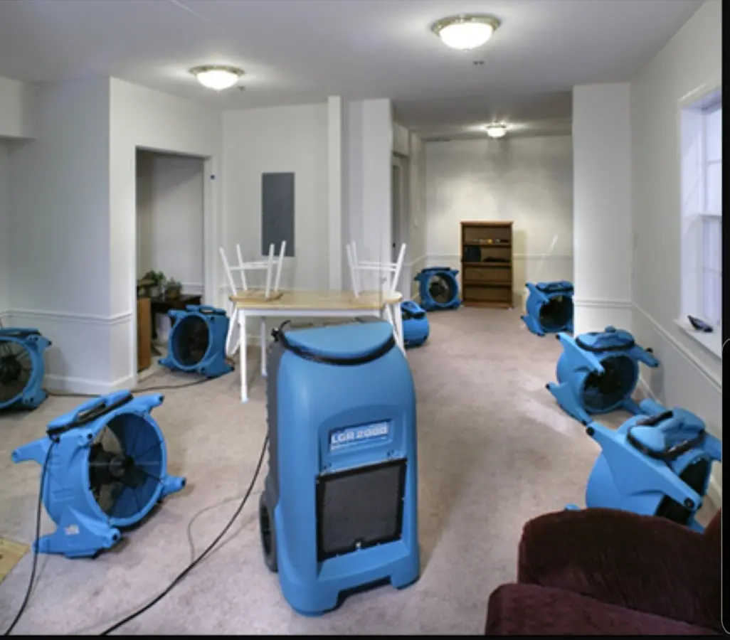 Air movers and dehumidifier setup for Water Damage Restoration in Frederickson